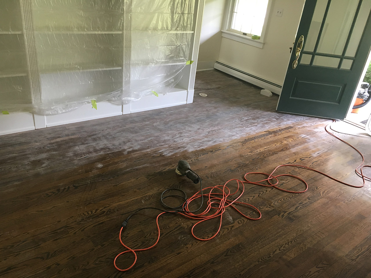 sanding the floor